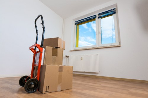 Moving van and boxed belongings ready for a Roehampton relocation