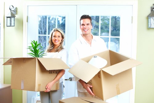 Packed moving boxes and home relocation setup in Roehampton