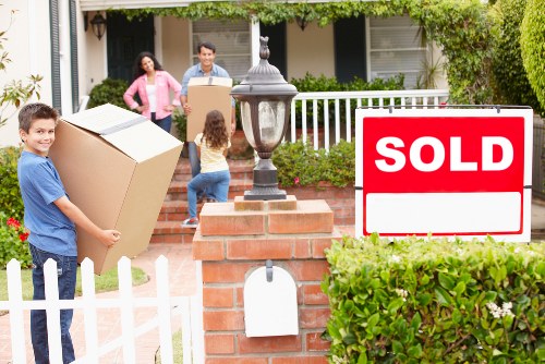 Packed household boxes prepared for removal truck hire